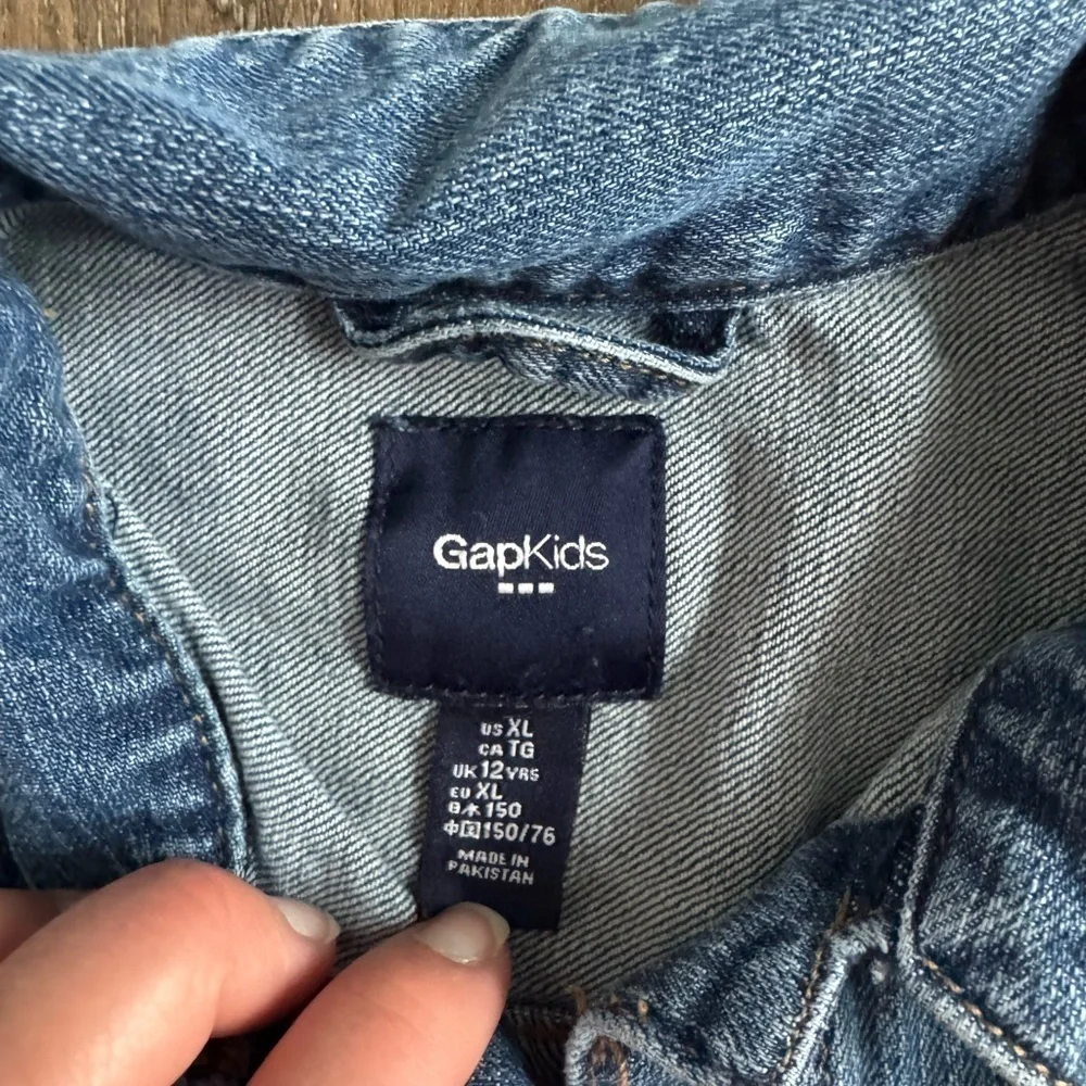 Gap Kids Jean Jacket.  Girl’s size XL.  Snap button closures.